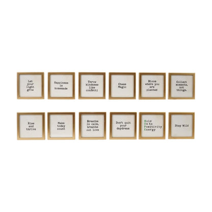 Set of 12 gold-framed glass magnets with motivational sayings on white backgrounds