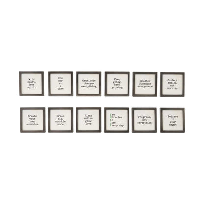 Set of 12 black metal framed glass magnets with inspirational sayings in black and green text