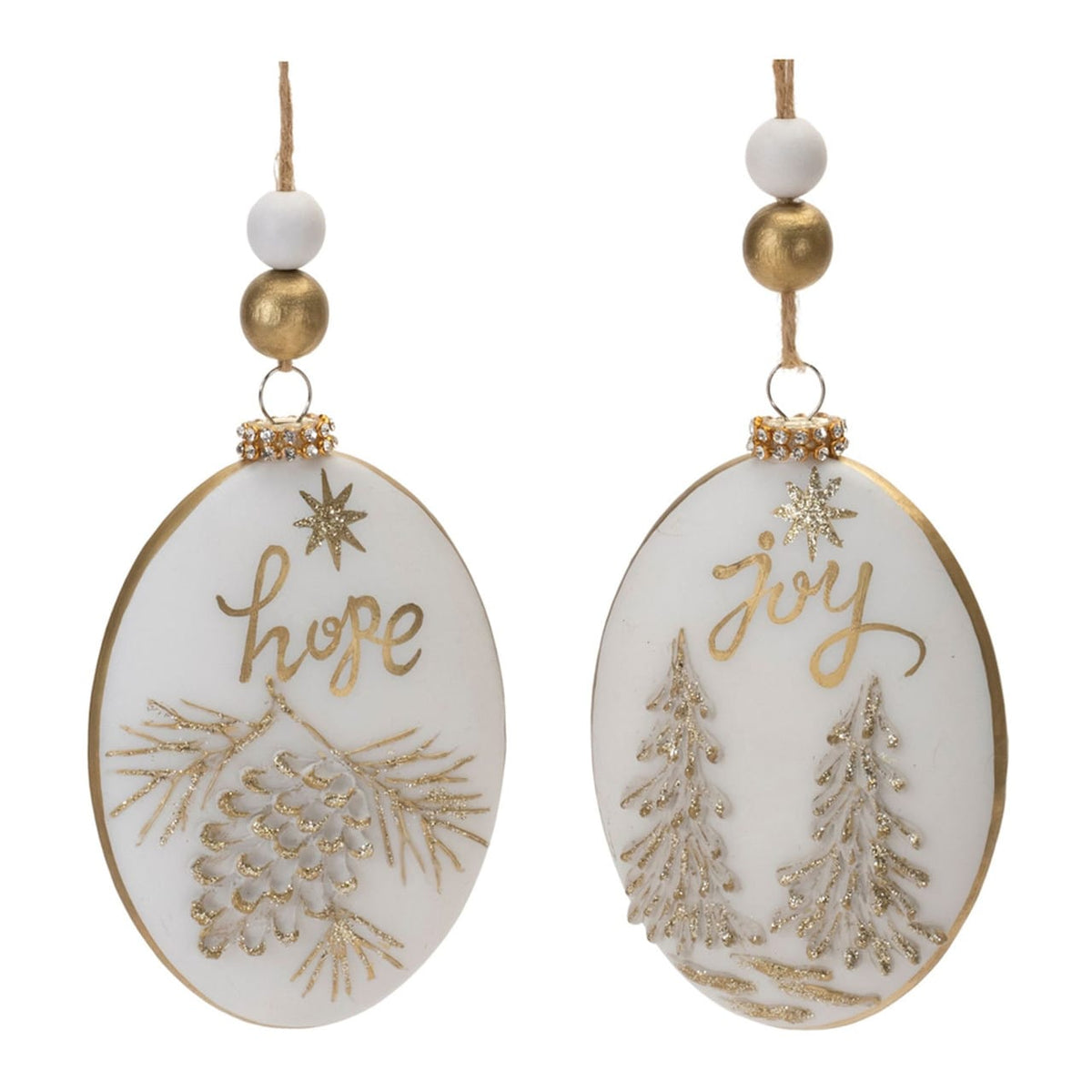 Two oval glass ornaments with gold 'Hope' and 'Joy' script, pinecone and Christmas tree designs
