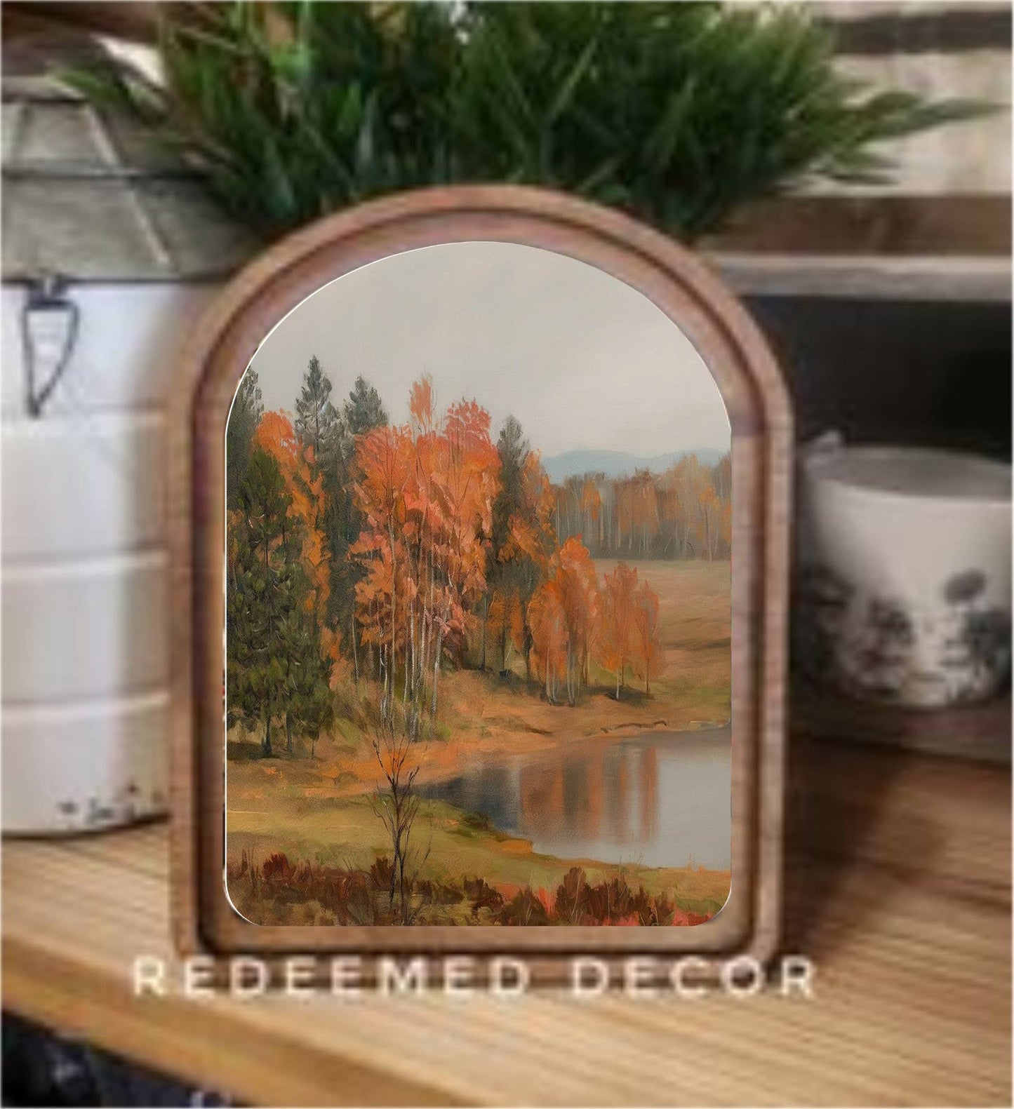 Arch-top wood framed canvas art print of autumn pond with orange trees