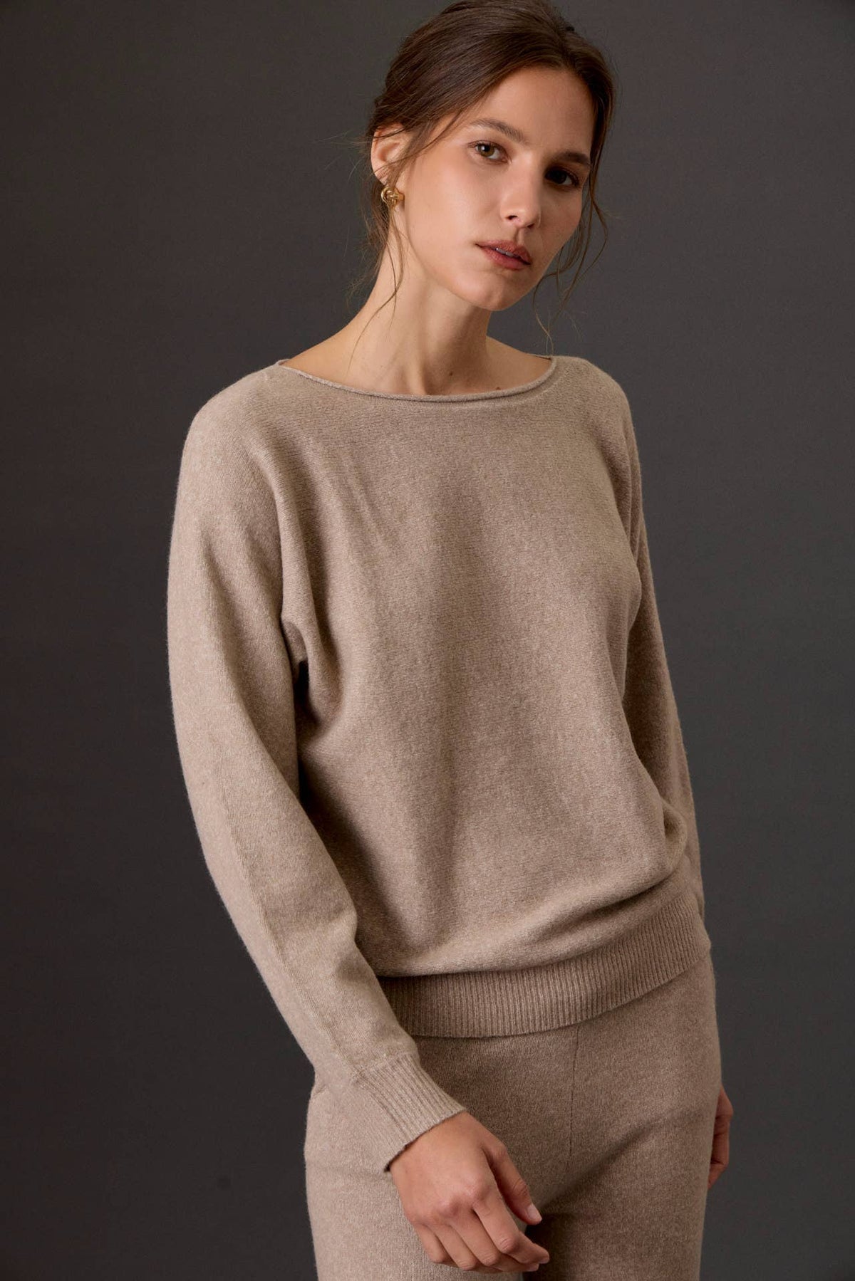 Women's relaxed heathered taupe boat neck knit sweater with ribbed cuffs and hem