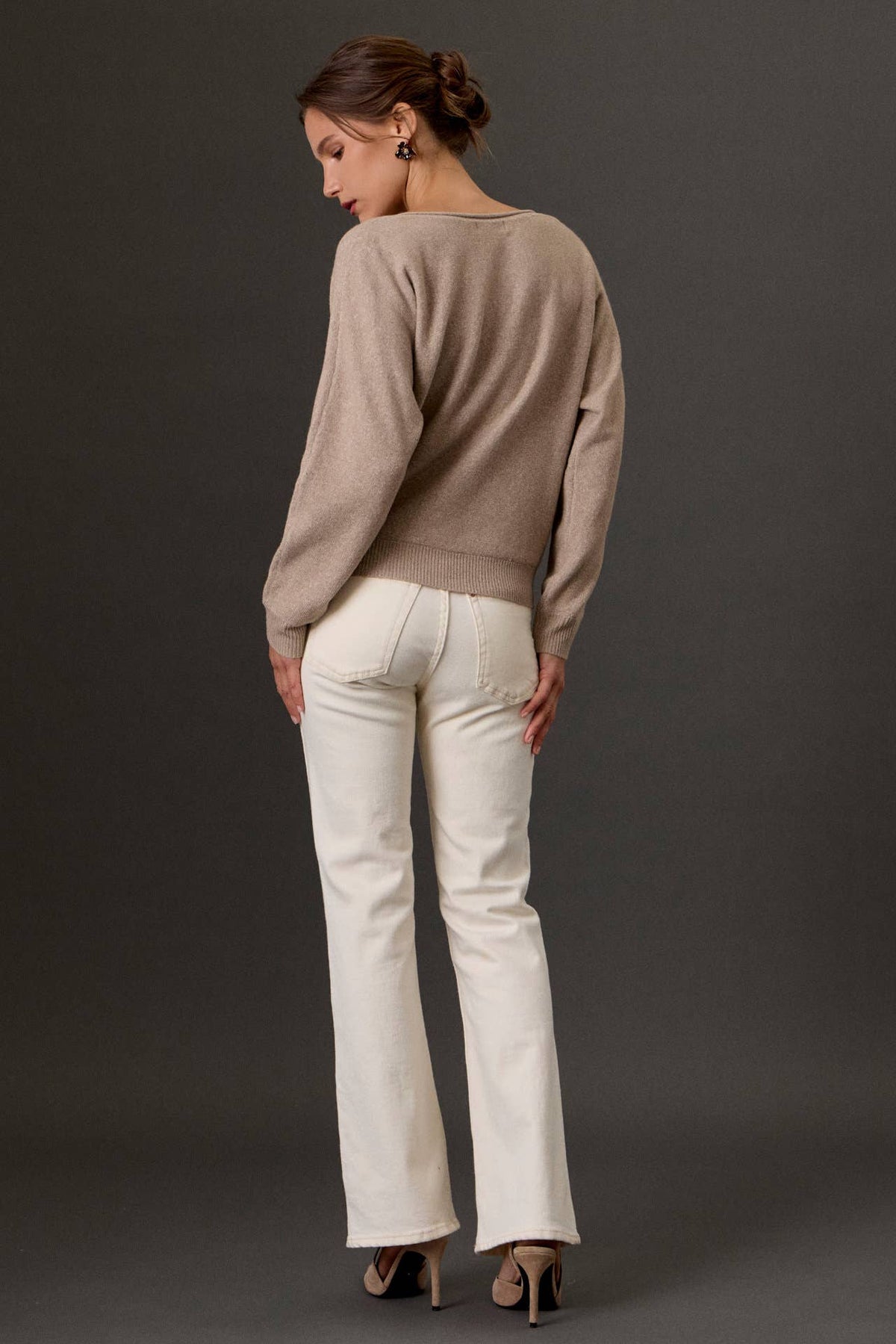 Heathered taupe boat neck sweater with ribbed hem, back view on model