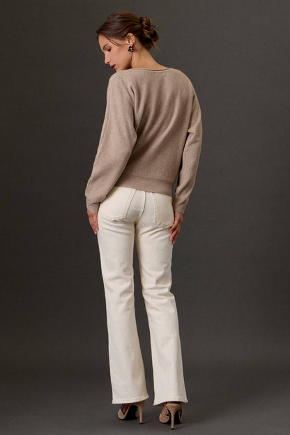 Heathered taupe boat neck sweater with ribbed hem, back view on model
