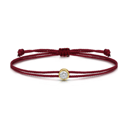 Burgundy adjustable cord bracelet with gold-bezel cubic zirconia charm slider closure