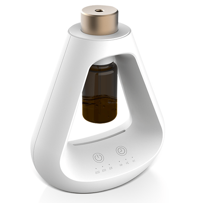 Candyl Delta white waterless essential oil diffuser with amber bottle and gold nozzle