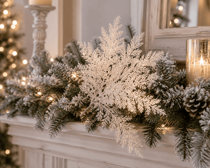 White frosted cedar spray with delicate branches displayed in a holiday garland arrangement