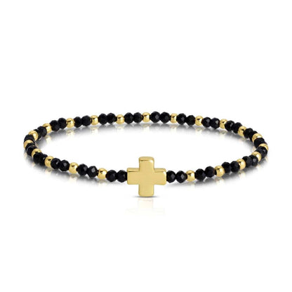 Black faceted crystal and gold bead stretch bracelet with gold cross charm