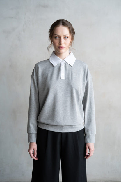 Heather grey long sleeve polo sweatshirt with white contrast collar and ribbed cuffs