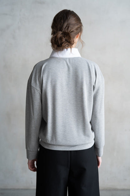 Grey marl long sleeve polo sweatshirt with white collar, back view