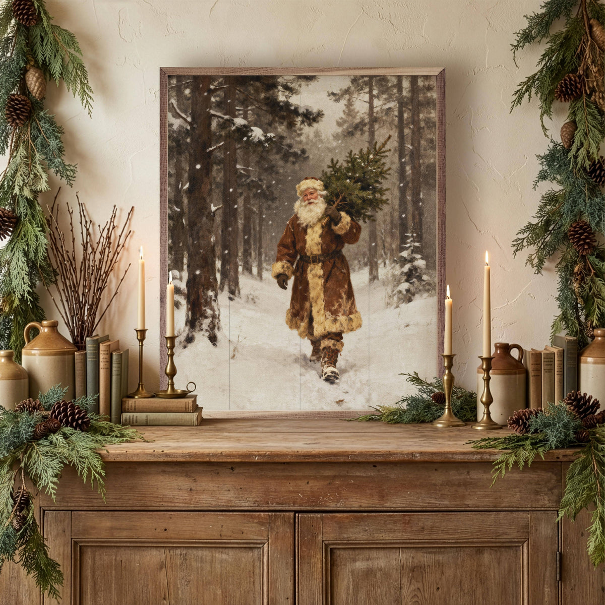 Framed vintage Santa carrying Christmas tree print displayed on rustic wooden sideboard