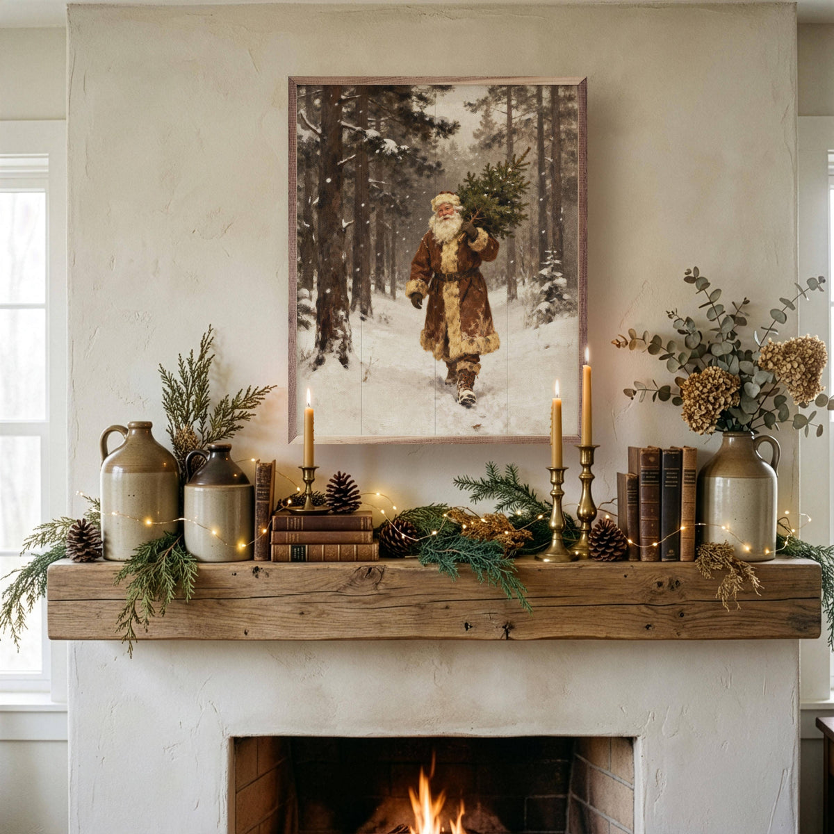 Vintage Santa carrying Christmas tree art print displayed above rustic fireplace mantel