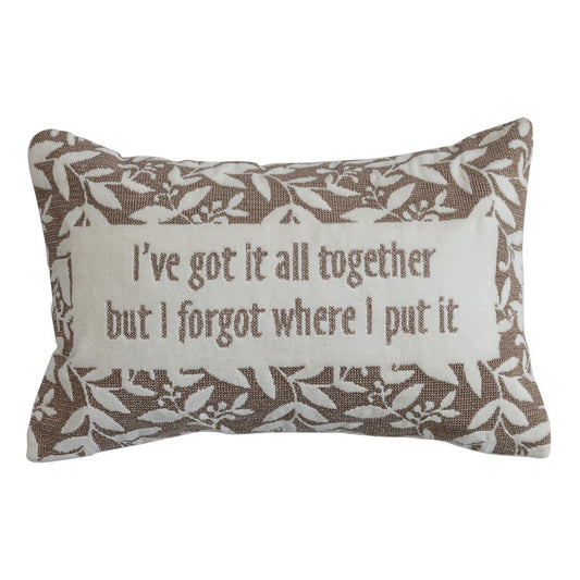 Rectangular decorative pillow with floral border and humorous quote about forgetfulness