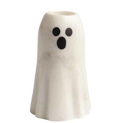 White marble ghost-shaped taper candle holder with black oval eyes and mouth, front view