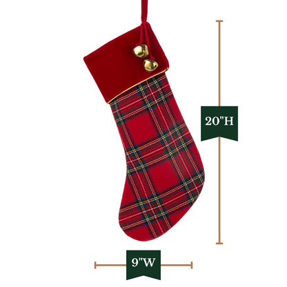 Red tartan plaid Christmas stocking with red velvet cuff and two gold jingle bells, shown with dimensions 20H x 9W