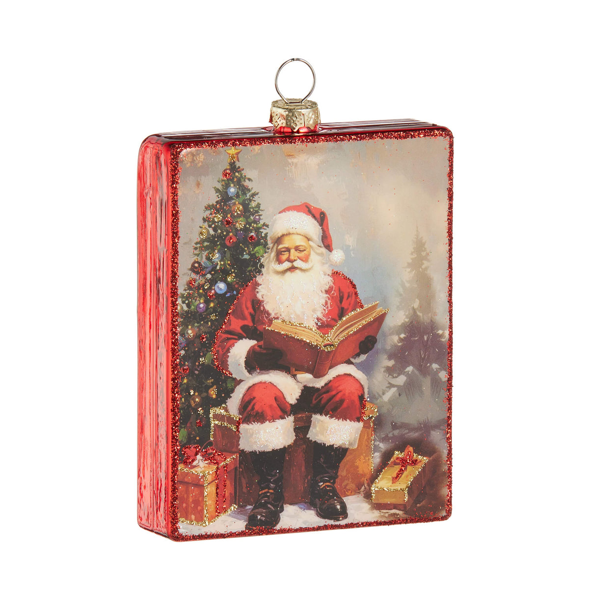Rectangle glass ornament depicting Santa reading a book beside a decorated Christmas tree with gifts