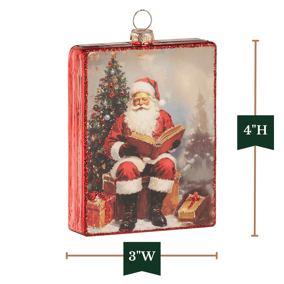 Rectangular glass ornament with Santa reading a book by a Christmas tree, red glittered edges