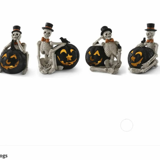 Four skeleton figurines in top hats seated with glowing black jack-o-lanterns and crow accents
