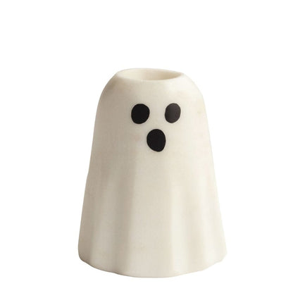 White marble ghost-shaped taper candle holder with black dot eyes and mouth, front view