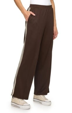 Brown wide-leg knit trousers with cream side stripes and elastic waist
