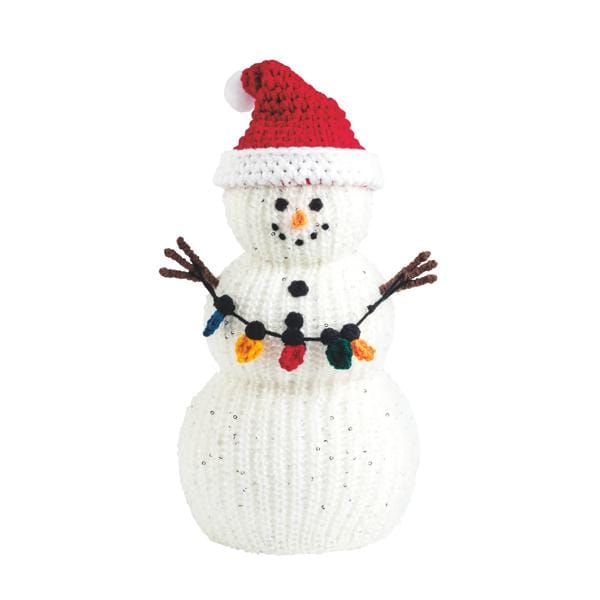Knit crochet snowman with red Santa hat, twig arms, and colorful Christmas light garland