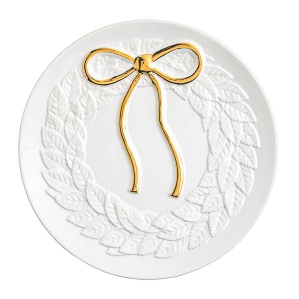 Round white ceramic plate with embossed leaf wreath and gold metallic bow on top