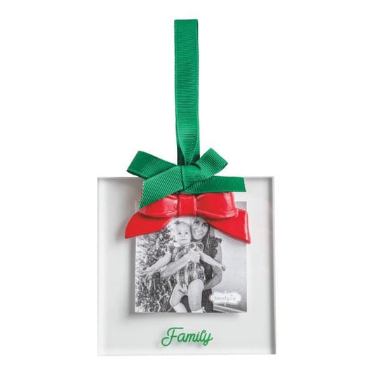 Square white acrylic ornament frame with red bow, green ribbon hanger, and 'Family' text