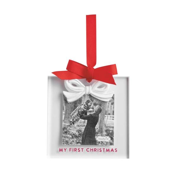 Square acrylic photo ornament with white bow and red ribbon, displaying a black-and-white family photo