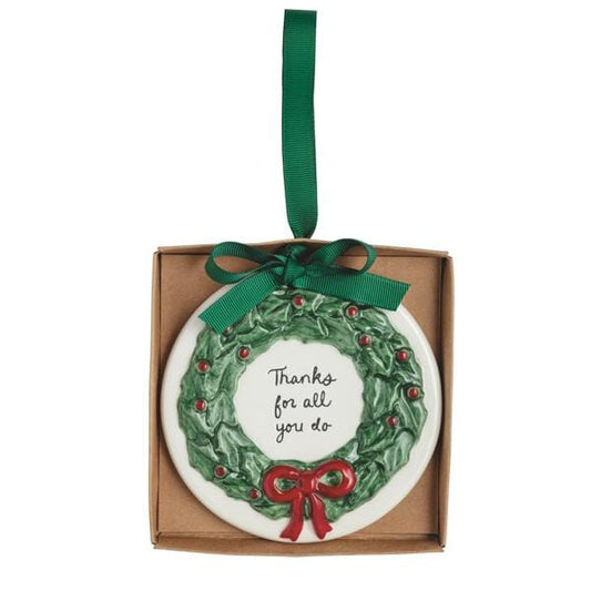 Ceramic wreath ornament with 'Thanks for all you do' text, displayed in kraft box with green ribbon