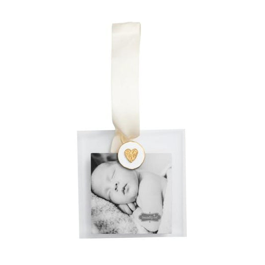 Square clear acrylic photo ornament with gold heart charm, ivory satin ribbon, and baby photo insert
