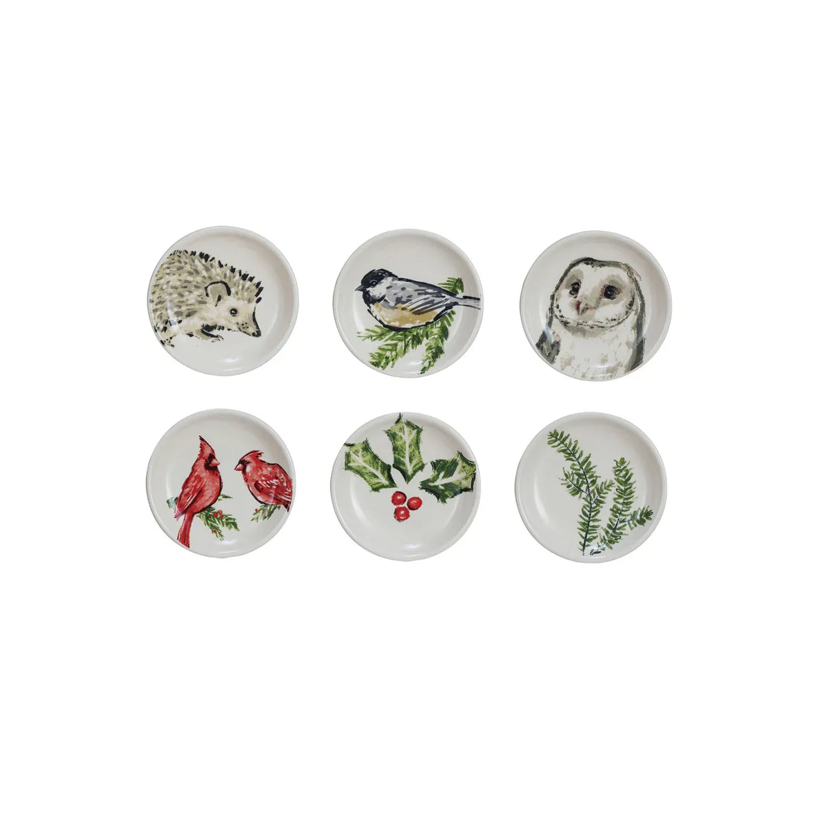 Set of six round white stoneware dishes with hedgehog, chickadee, owl, cardinal, holly, and fern designs