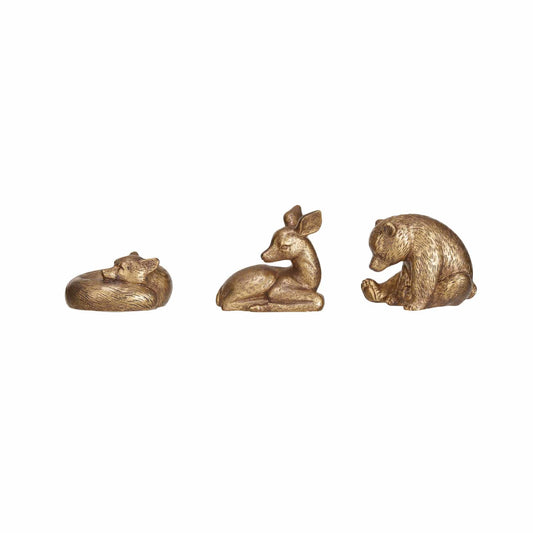 Set of three antique gold resin animal figurines: fox, fawn, and bear cub
