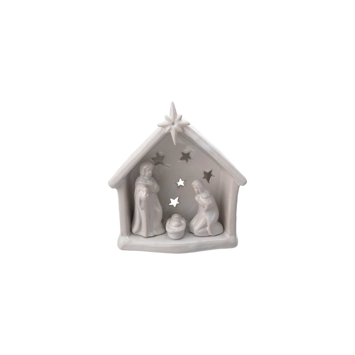 White stoneware nativity tealight holder with star cut-outs and Holy Family figures
