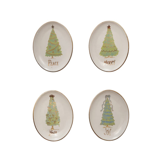 Set of four oval stoneware dishes with Christmas tree designs reading Peace, Merry, Noel, Joy