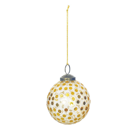 Clear glass ball ornament with gold sequin dots and metallic cap on gold string