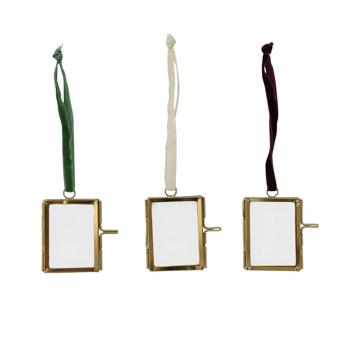 Set of three brass glass photo frame ornaments with green white and burgundy velvet ribbon hangers